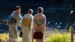 Kimono-clad women laughing together, Meiji Garden